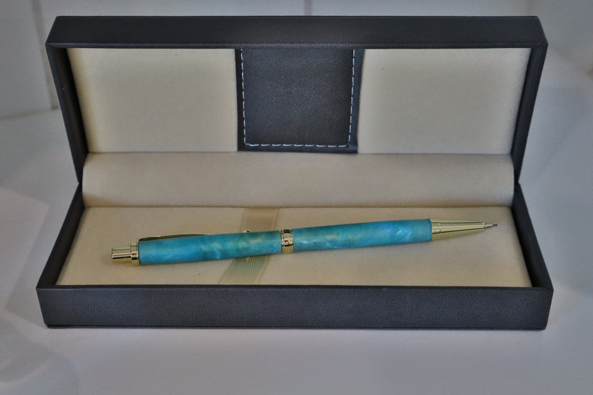 Handmade aqua marbled click pencil with gold-tone fittings shown from the opposite side