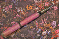 Handmade pink twist ballpoint pen with gold-tone fittings