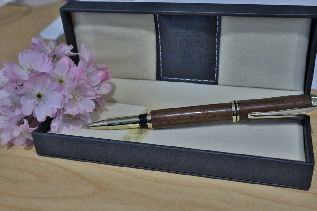 Handmade walnut JR Gents style rollerball pen in presentation case with pink flowers