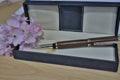 Handmade walnut JR Gents style rollerball pen in presentation case with pink flowers
